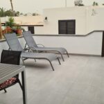 The large terrace at Bungalow No 31 is fully furnished with 2 sunloungers and dining table to seat 4.